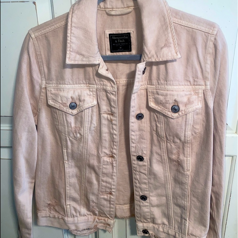 Lightly worn pale pink jean jacket